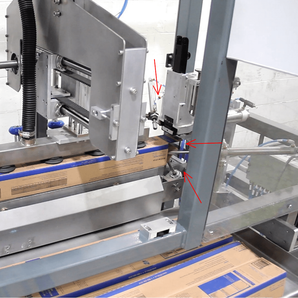 Cartoner for forming long double-wall cartons with automatic bottom stapling
