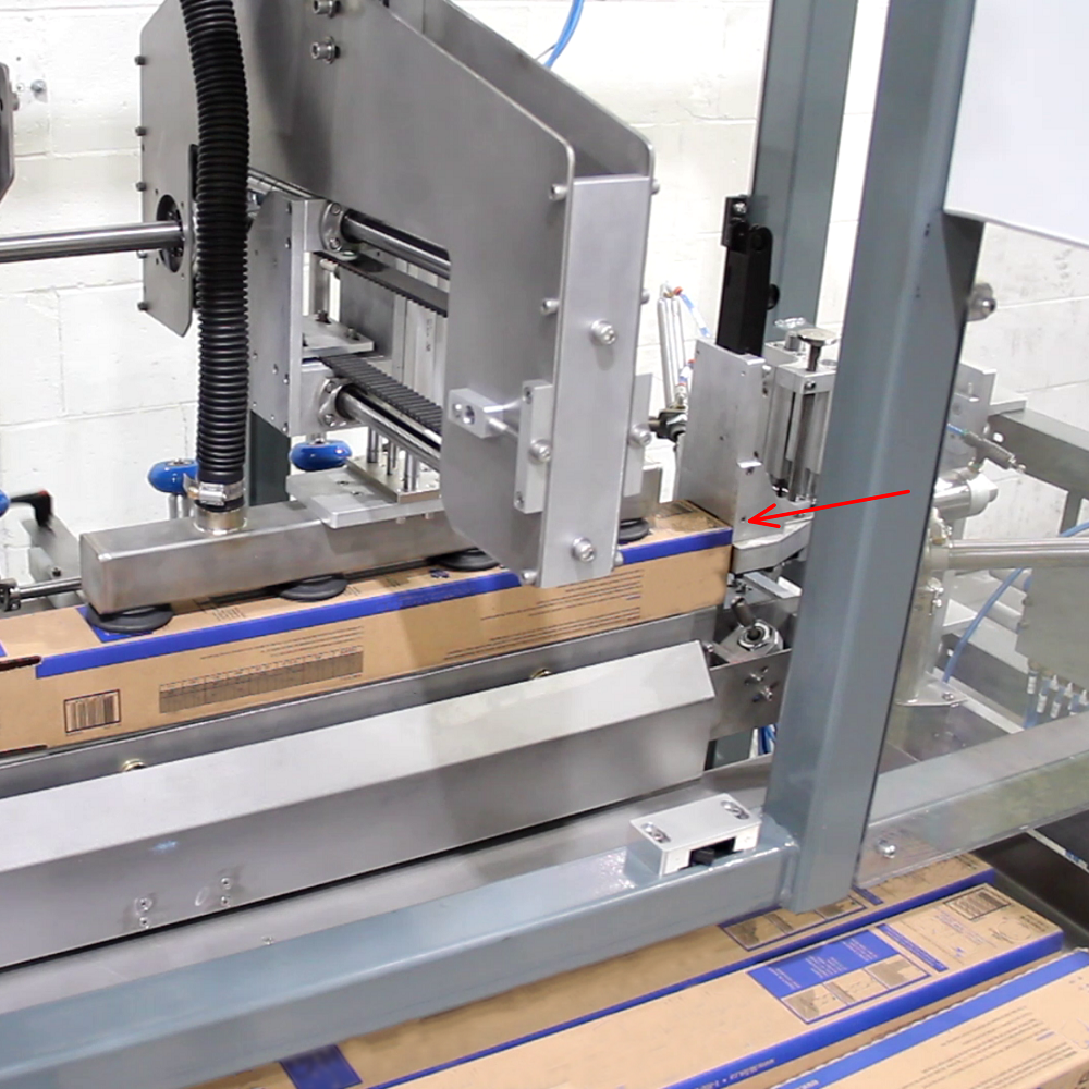 Cartoner for forming long double-wall cartons with automatic bottom stapling