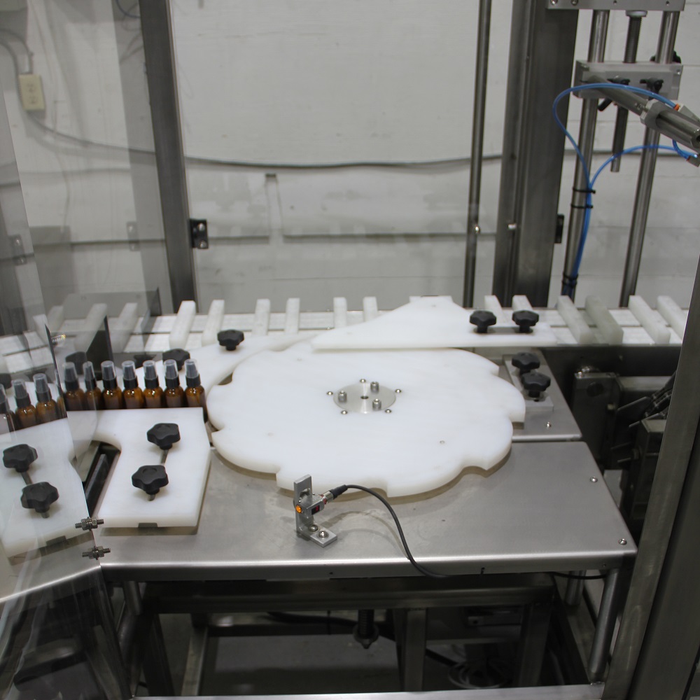 Automatic robotic cartoner machine for loading several different products