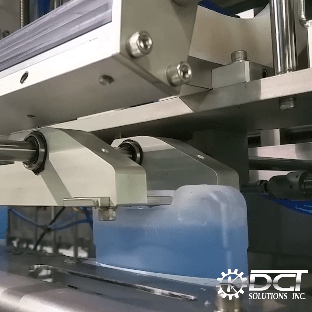 Automatic inline multi-head capping machine